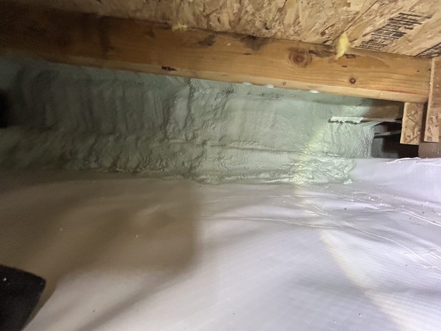 Crawlspace encapsulation with CleanSpace matting and Polyethylene spray foam.