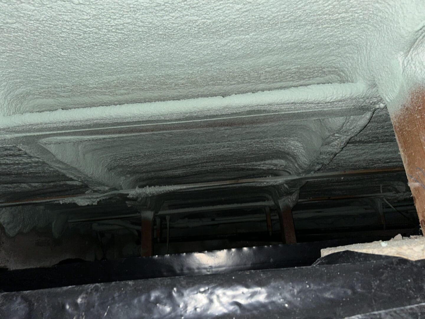 Crawlspace spray foam in Eugene, Oregon. Dr. Energy Saver insulation install with brand new vapor barrier.