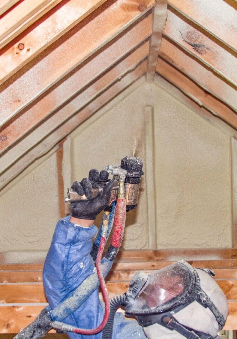 Spray foam insulation in Eugene OR by Dr. Energy Saver in an attic space to reduce energy costs
